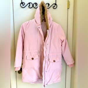 Warm winter coat with hood and two deep pockets.